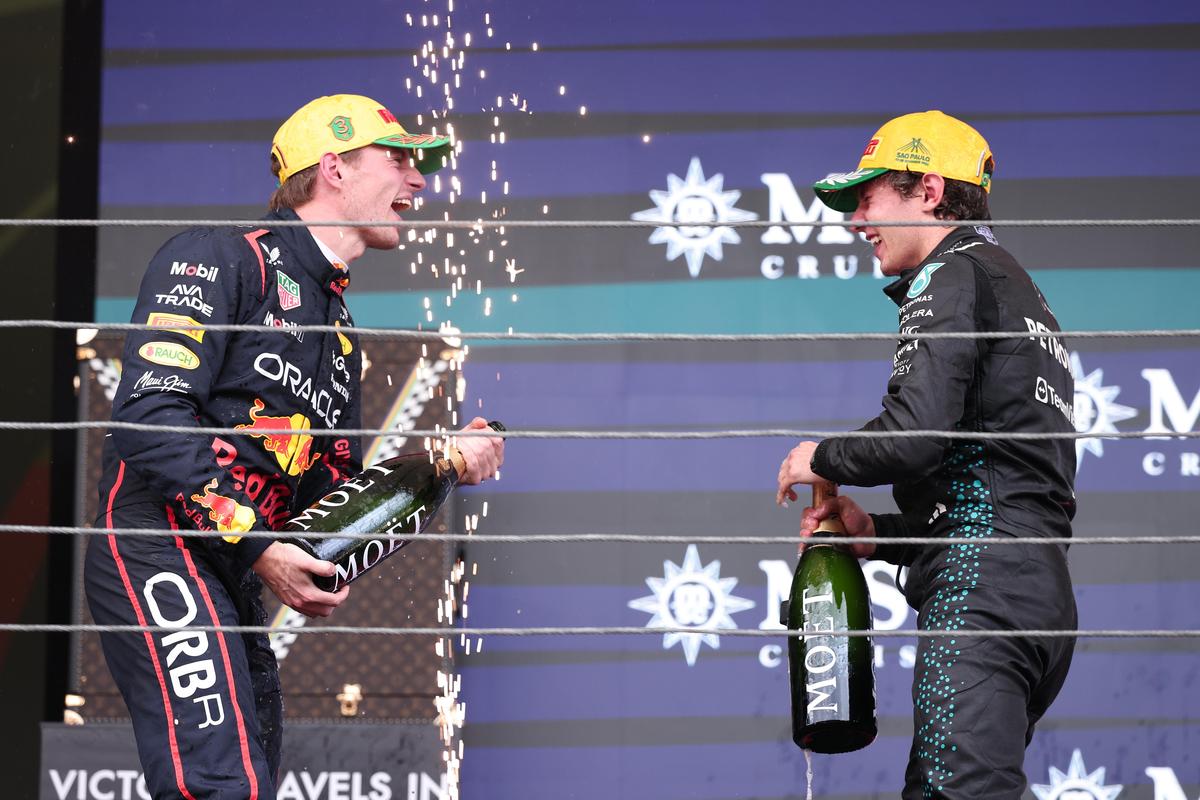 Strong show: Max Verstappen (left) mounted an unforgettable charge through the field to finish third, keeping himself firmly in title contention. 
