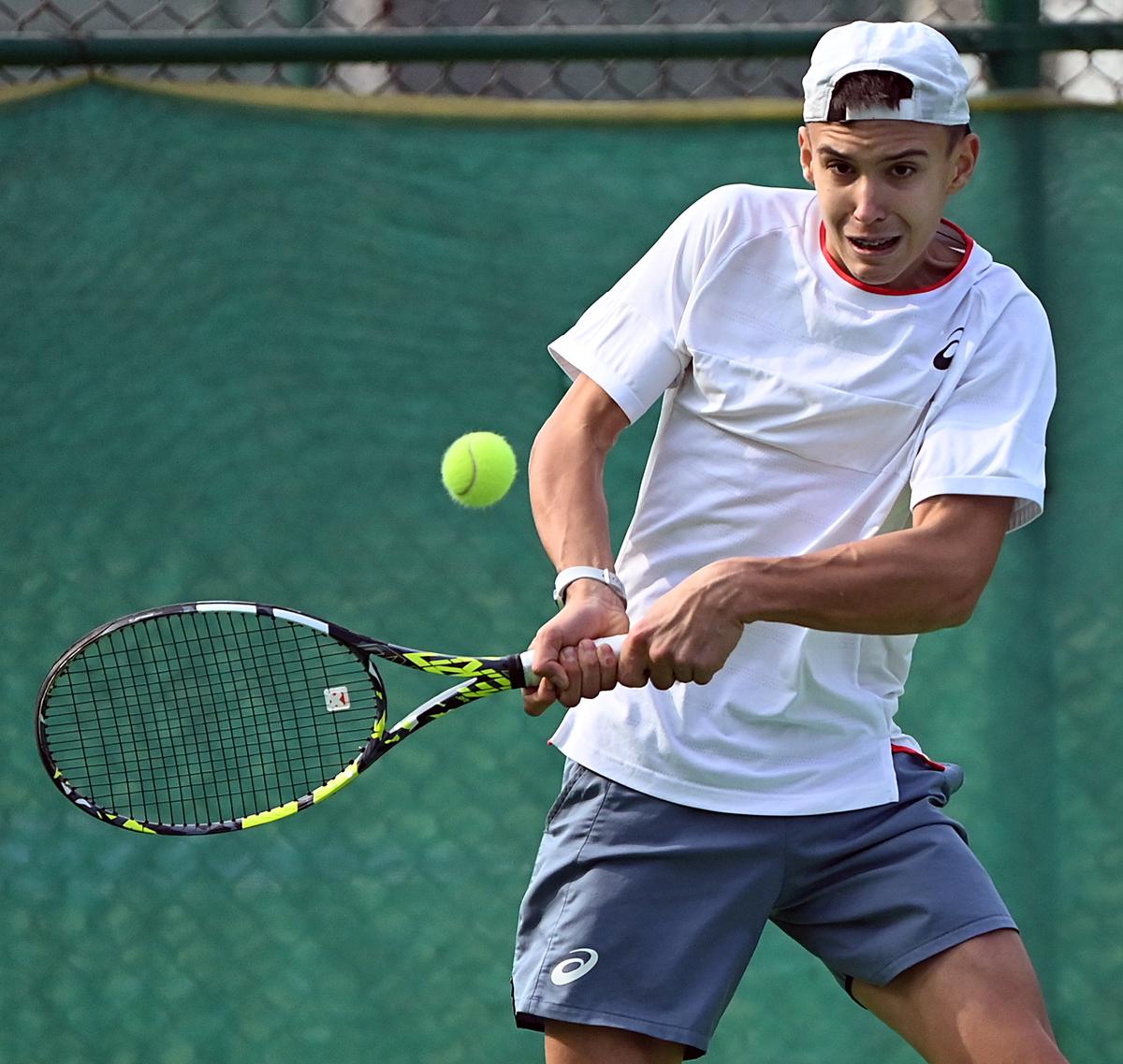 Nikita Bilozertsev of Ukraine on his way to the final in the ITF junior tennis tournament in Delhi on Friday. 