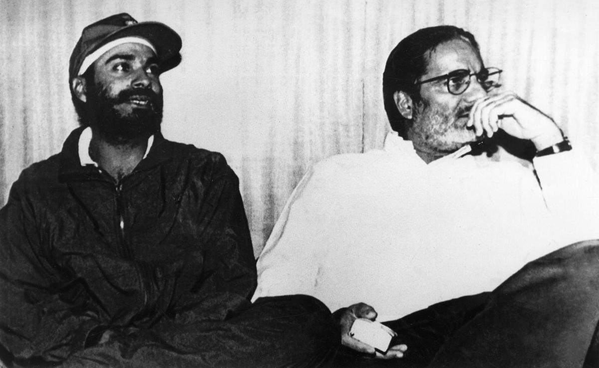 Inderjit Singh Bindra con el ex jugador del equipo de cricket indio Navjot Singh Sidhu.