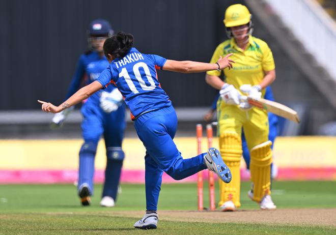 India’s Renuka Singh Thakur celebrates the dismissal of Australia’s Beth Mooney during the women’s T20 cricket match on day one of the Commonwealth Games at Edgbaston in Birmingham on Friday. 