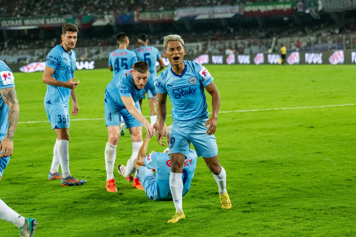 Bipin Singh Thounaojam of Mumbai City FC celebrates scoring against Mohun Bagan in the ISL final.