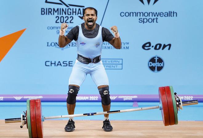 Gururaja Poojary reacts after winning the bronze medal in the Men’s 61kg Weightlifting event at the Commonwealth Games 2022. 