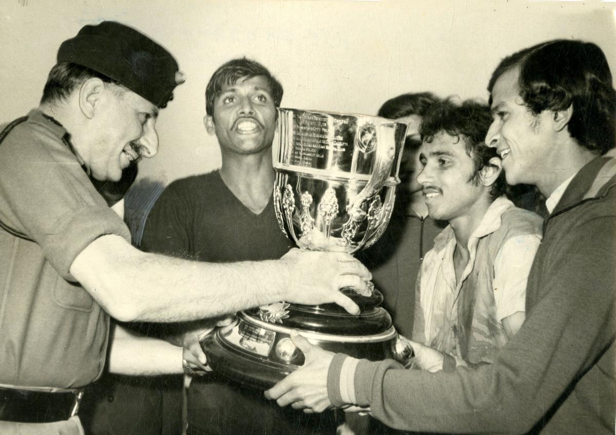 Picture shows Field Marshal Sam Manekshaw presenting the Durand trophy to Sudhir Karmakar, the skipper of the East Bengal team. East Bengal triumphed over Mohun Bagan with a goal scored through a penalty kick. 