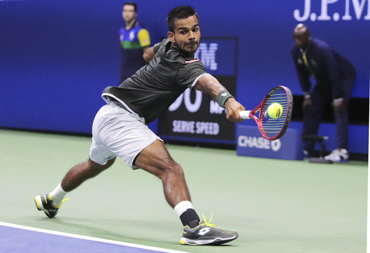 Sumit Nagal in action against Roger Federer in the first round of the U.S. Open tennis tournament in 2019.