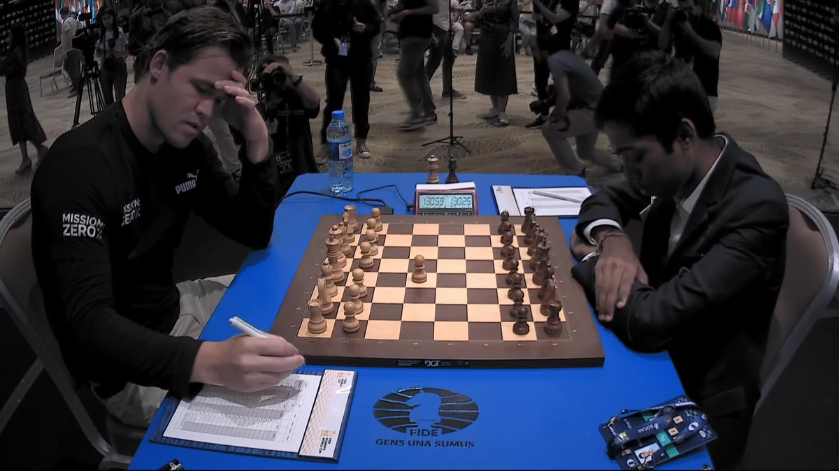 Carlsen Sacs 2 Pawns, Scores Pretty Win 