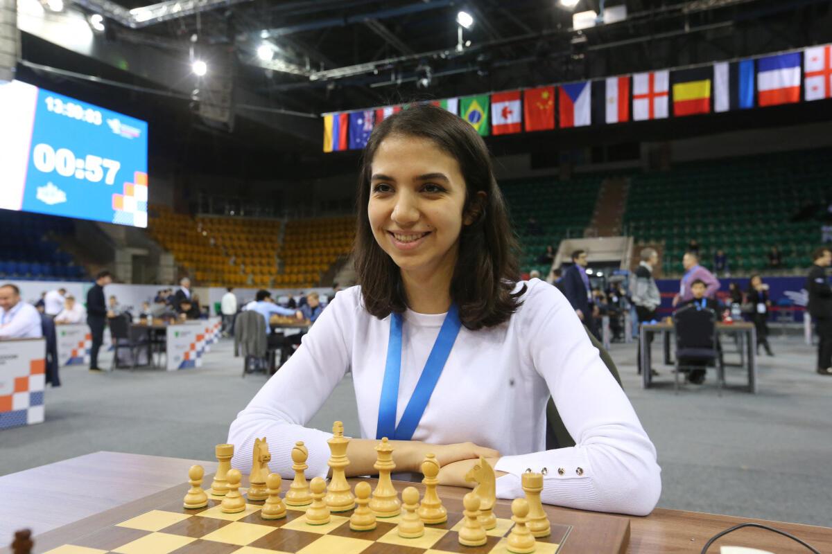 Exiled Iranian chess player says not herself with hijab