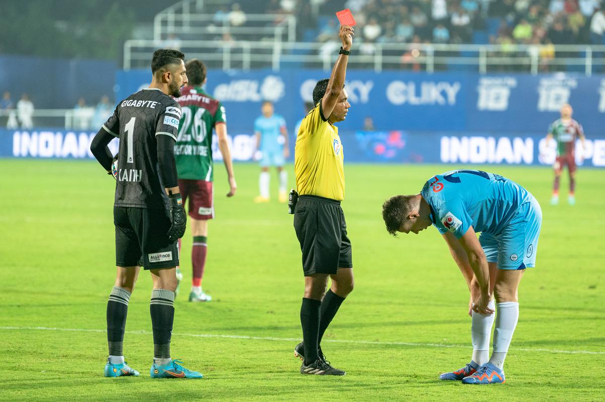 FILE PHOTO: Match Referee shows red card to Greg Stewart of Mumbai City FC during the ISL 2023-24 match between Mumbai City FC and Mohun Bagan Super Giant held at the Mumbai Football Arena.