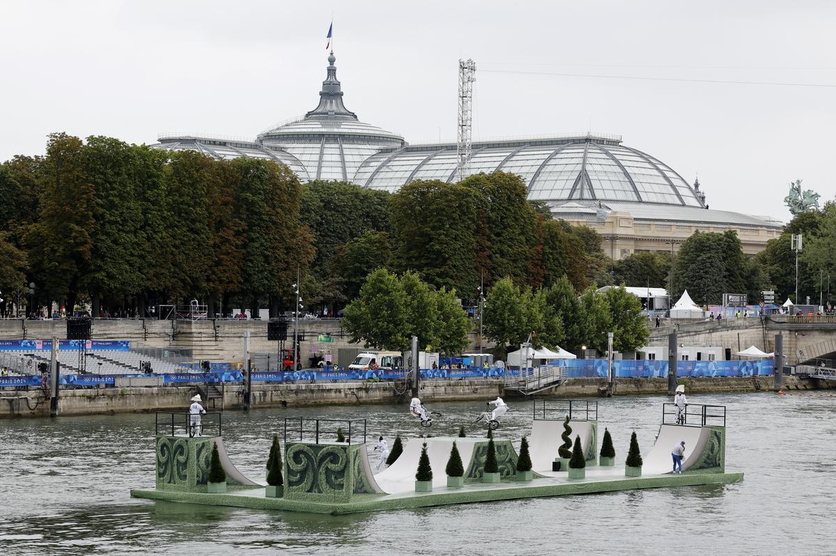 Performers practice at the river Seine ahead of the opening ceremony of the Paris 2024 Olympics.