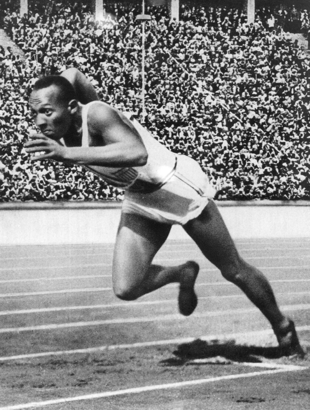 Jesse Owens in action at the 1936 Summer Olympics in Berlin, where he won four gold medals.