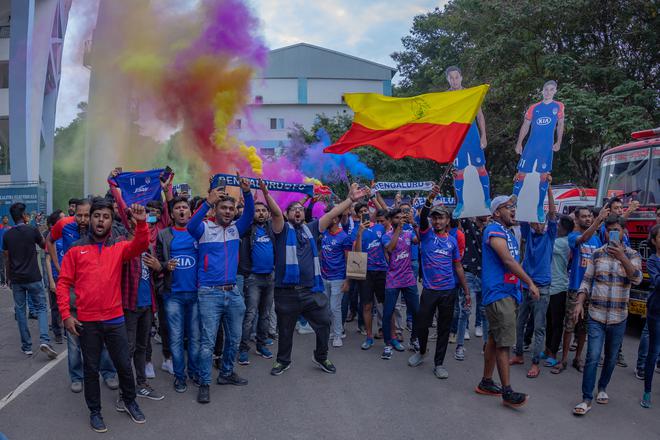 Fans arrive at the Sree Kanteerava Stadium, Bengaluru, on Saturday for the Indian Super League match between Bengaluru FC and NorthEast United FC.