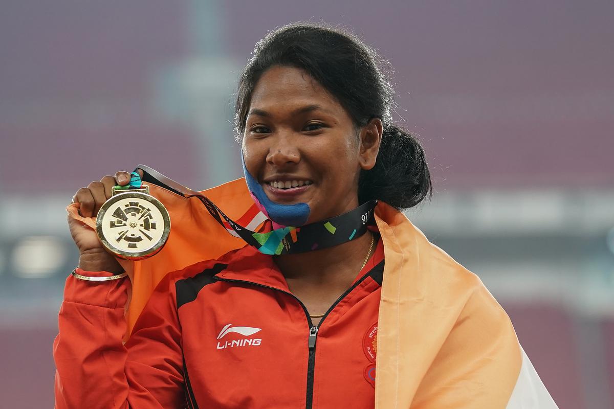 Gold medallist Swapna Barman of India celebrates during the medal ceremony of the women’s heptathlon at Asian Games 2018.