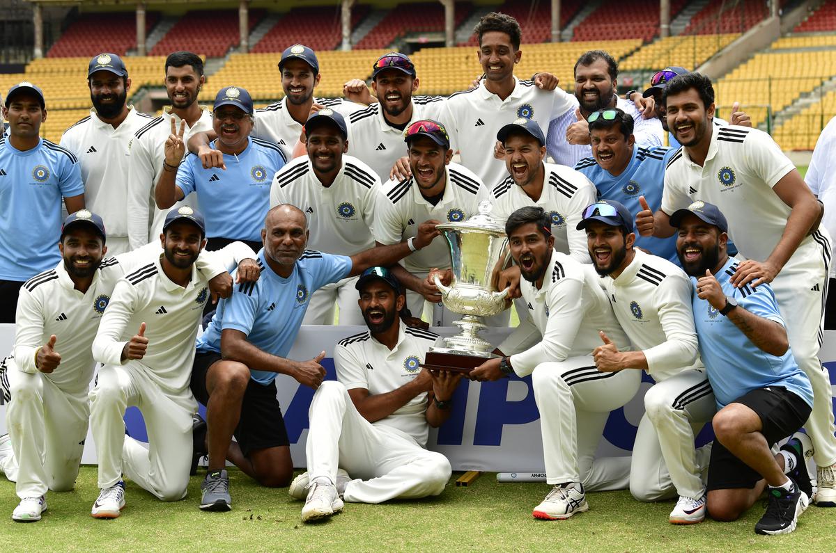 One for the album: South Zone players pose with the Duleep Trophy after their win.