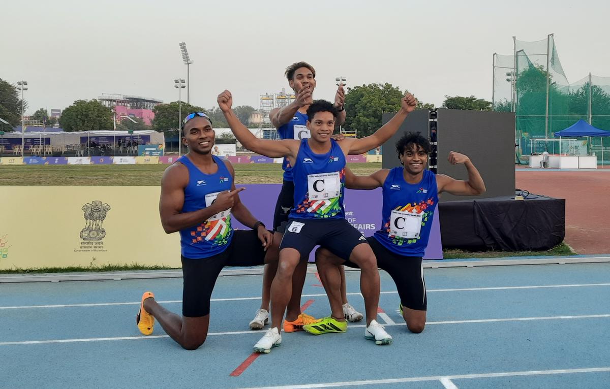 The Khelo India University Games 2025 men’s 4x100m gold medal-winning team from Kalinga Institute of Industrial Technology, comprising Animesh Kujur (left), D. Mrutyam Jayaram (back middle), Santa Mahendra (front middle) and Abhay Singh.