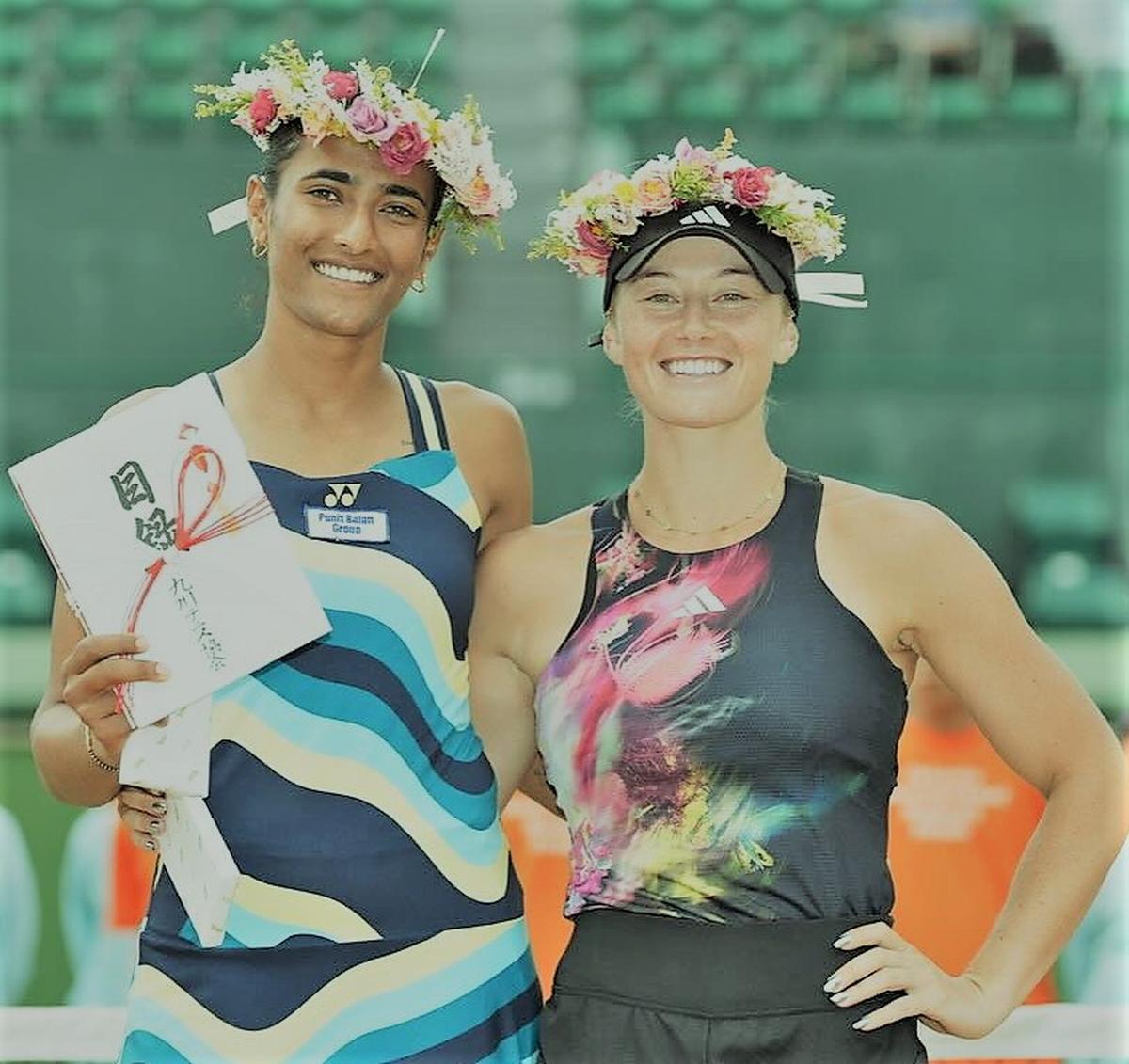 Rutuja Bhosale and Paige Hourigan, the doubles champions in
the ITF women’s tennis event in Japan.