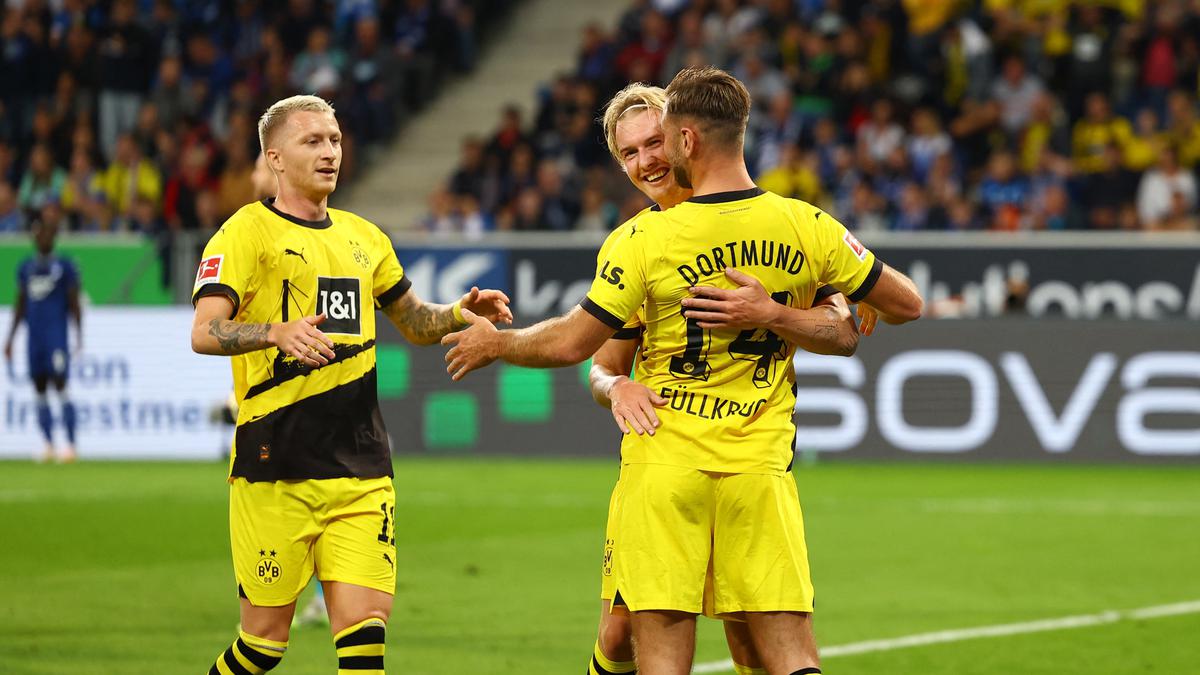 Bundesliga: Uneven Dortmund holds on with 10 men to beat Hoffenheim 3-1