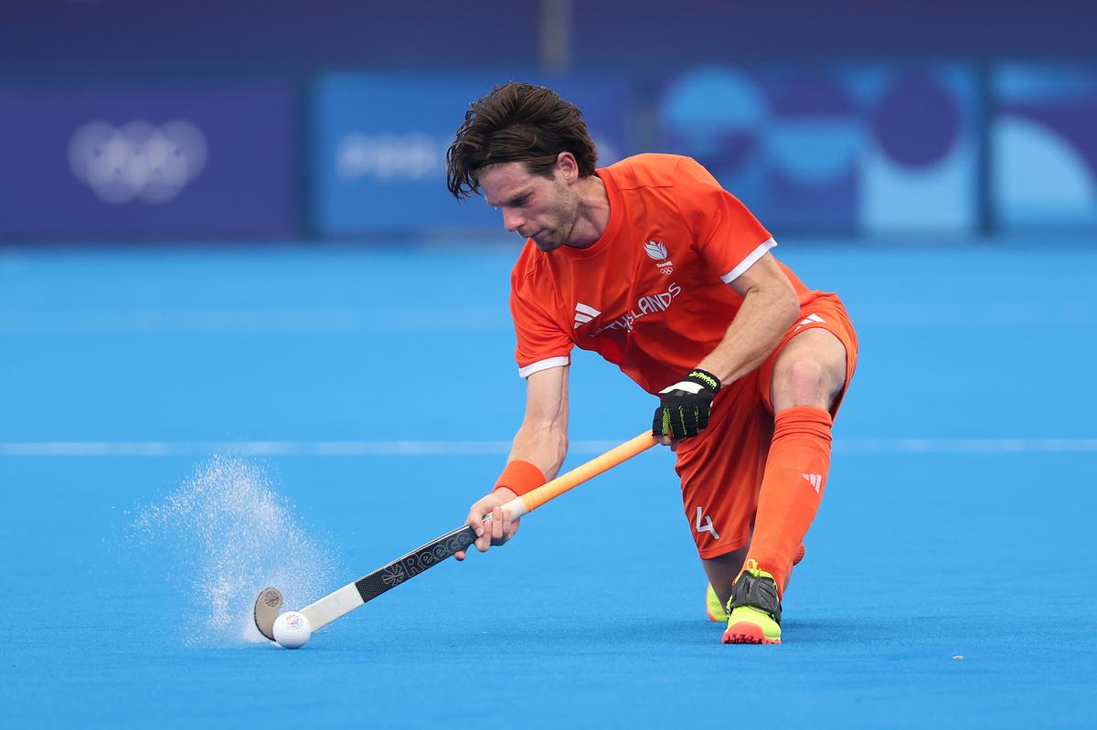 Lars Balk of Team Netherlands passes the ball during the Men’s Pool A match between Germany and Netherlands on day five of the Olympic Games Paris 2024.