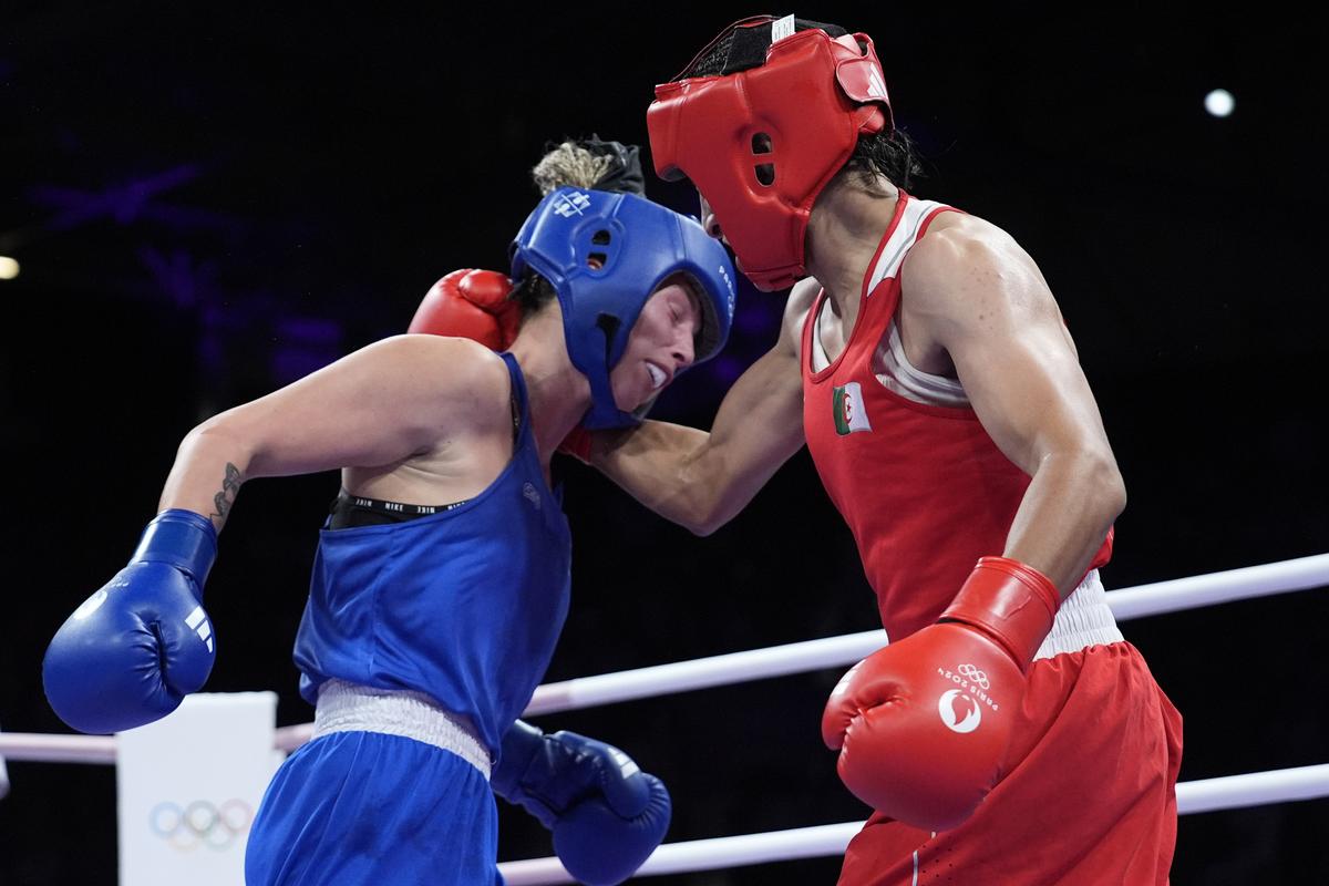 Hamori (in blue), who had preceded the bout with hateful images of the Algerian on her social media, was reportedly treated with boos, while Khelif had vehement support in the crowds.