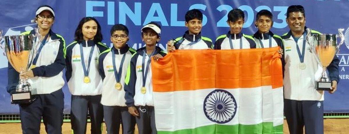 The Indian girls and boys teams with their trophies in the Asian under-12 tennis championship in Shymkent, Kazakhstan. 