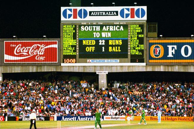 The scoreboard tells the story as England wins a controversial rain-affected game on run rate in the World Cup semifinal against South Africa at the SCG. 