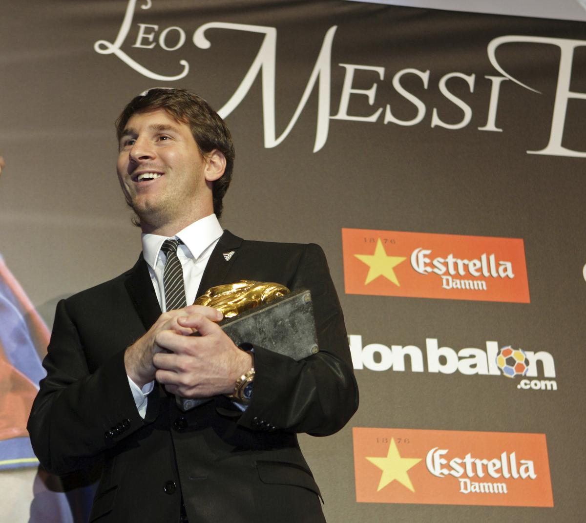 Messi poses with the Bota de Oro (Golden Shoe) trophy awarded to him as top scorer of all European Leagues, in Barcelona September 30, 2010.