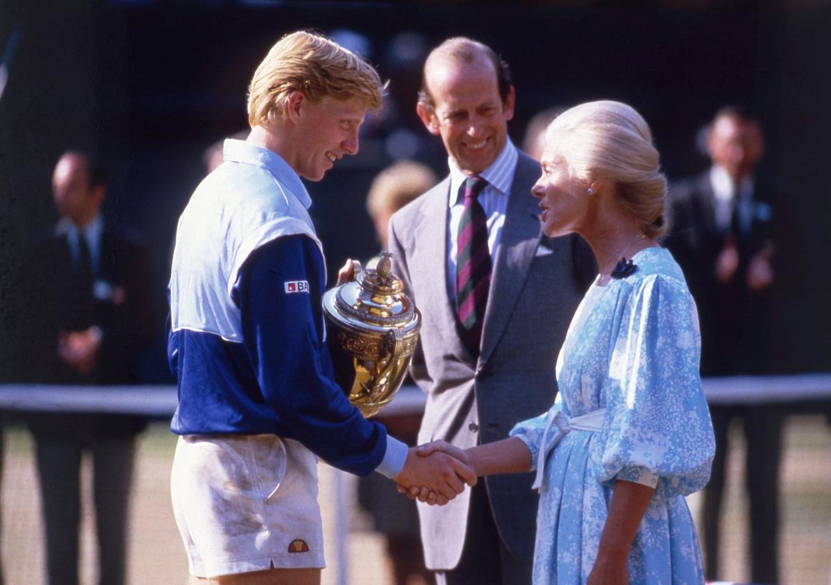 Boris Becker receives the trophy from the Duke and Duchess of Kent after winning the Wimbledon men’s singles title in London on July 7, 1985. Becker, aged 17.