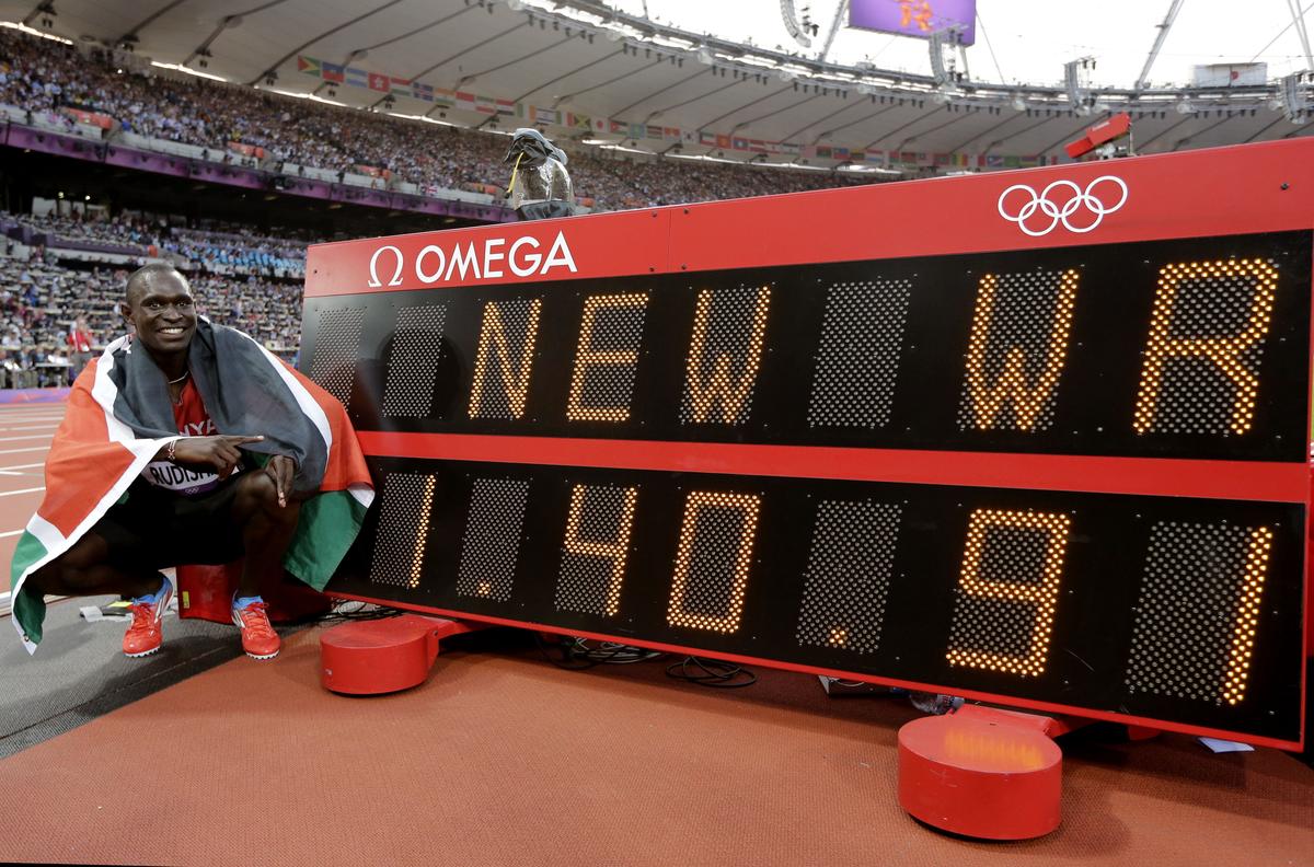 Kenya’s David Rudisha poses after setting a new world record of 1:40.91s in men’s 800m final during the London Olympics.