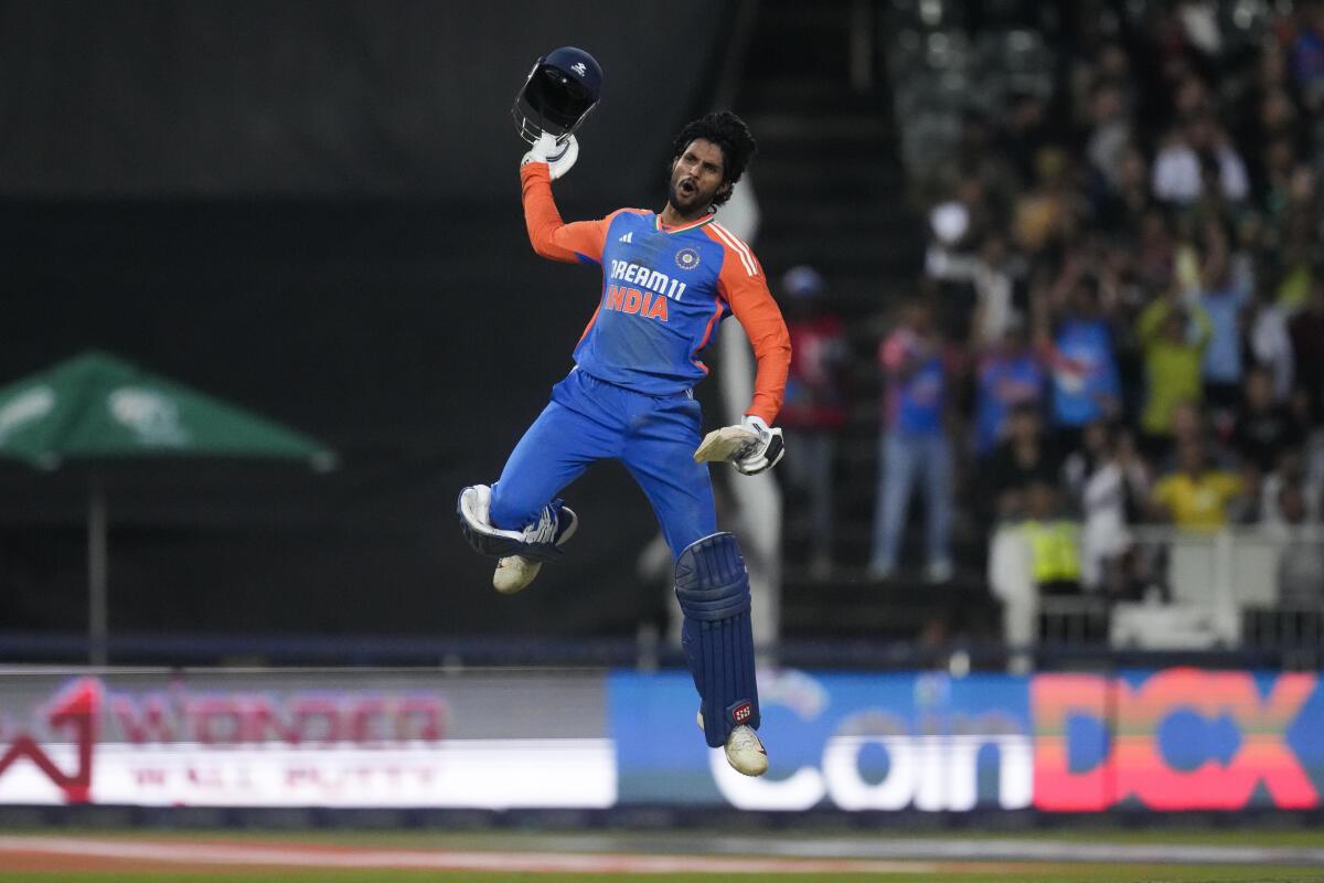 India‘s Tilak Varma celebrates after scoring a century during the fourth T20 match against South Africa.