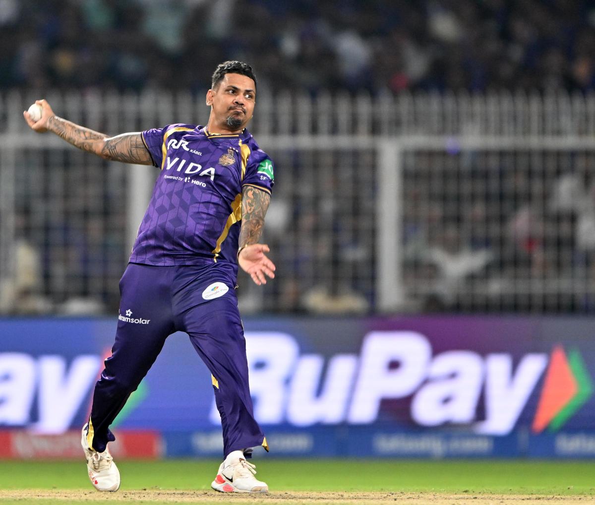 CSK vs KKR, IPL 2026: Chennai Super Kings, Kolkata Knight Riders clash looking to jump up from last place  The 2026 Indian Premier League (IPL) has reached the 21-match mark, with each team having played four games. The tournament’s traditional heavyweights find themselves in uncharted territory.The points table tells a bizarre story of shifting power: the teams currently in the top half share only three titles between them, while the bottom half contains a staggering 14 trophies’ worth of experience.On Tuesday, the M.A. Chidambaram Stadium hosts a make-or-break fixture between two of these struggling giants. The home side, Chennai Super Kings (CSK), sits at a precarious ninth place, while the Kolkata Knight Riders (KKR) languish at the bottom with a solitary point from four outings.PowerPlay woesCSK finally halted a gruelling six-match home losing streak with a 23-run win over Delhi Capitals last time out. The victory was fuelled by Sanju Samson’s maiden century in yellow—a long-awaited return on investment for the high-profile trade from Rajasthan Royals—and a sharp bowling performance led by Jamie Overton.However, captain Ruturaj Gaikwad’s form is a glaring liability. With just 56 runs at an average of 14.00 and a strike rate of 103, his ultra-cautious PowerPlay approach has stifled the team’s momentum.ALSO READ | Gujarat Titans vs Chennai Super Kings fixtures swapped owing to municipal electionsPromoting the fearless Ayush Mhatre to open while shifting Gaikwad to the number three spot could provide the spark currently lacking in the first six overs.Furthermore, while Dewald Brevis only contributed a couple of catches in his return, his presence in the middle order offers a higher ceiling for a unit desperate for high-impact players in the absence of MS Dhoni.On the bowling front, the inclusion of West Indian Akeal Hosein has paid dividends. He replaced a struggling Matt Henry and has provided a quick fix for CSK’s PowerPlay bowling. With support from Overton and Anshul Kamboj, the bowling unit seems to have finally taken shape.Searching for solutionsKKR’s problems are equally systemic. While Finn Allen provides a fear factor with a strike rate north of 200, his frequent early exits have forced Ajinkya Rahane and Angkrish Raghuvanshi to rebuild rather than accelerate.The middle-order finishers have also gone cold: Rinku Singh has managed just 72 runs this season, while Rovman Powell has contributed only 39. The KKR spin-bowling attack has picked only five wickets in 24.1 overs bowled, at an economy rate of 9.26.
                                                            | Photo Credit: 
                                RV MOORTHY
                            

                            The KKR spin-bowling attack has picked only five wickets in 24.1 overs bowled, at an economy rate of 9.26.
                                                            | Photo Credit: 
                                RV MOORTHY
                                                    The imbalance is deepened by Cameron Green’s lack of rhythm with the bat. Additionally, the game against Lucknow Super Giants was the first time he bowled this season, and he conceded 28 runs in two overs. KKR ended up on the losing side as Mukul Choudhary pulled off a heist in a last-ball thriller.While Vaibhav Arora and Blessing Muzarabani have shown sparks, the bowling unit has appeared sub-par without consistent spin support. The spinners have returned with just five wickets in 24.1 overs and have conceded at 9.26 runs per over thus far this season.Adding to the visitor’s woes, Varun Chakaravarthy remains a doubt following a finger injury during the Sunrisers Hyderabad game, though he has returned to training.Come Tuesday, the fixture represents more than just two points for the teams. It provides them with a crucial opportunity to stabilise their campaigns and stay relevant in the playoff conversation.Published on Apr 13, 2026  #CSK #KKR #IPL #Chennai #Super #Kings #Kolkata #Knight #Riders #clash #jump #place