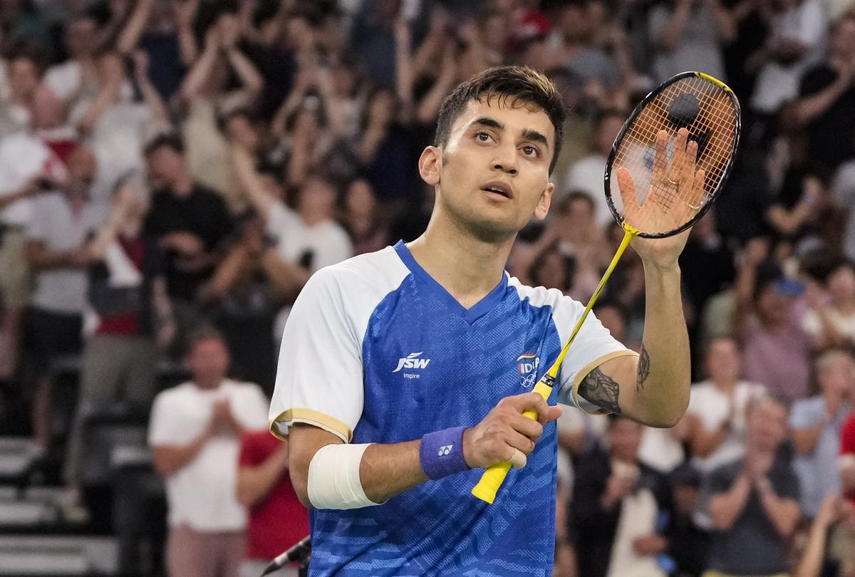 India’s Lakshya Sen acknowledges fans after his men’s singles bronze medal badminton match against Malaysia’s Lee Zii Jia. 