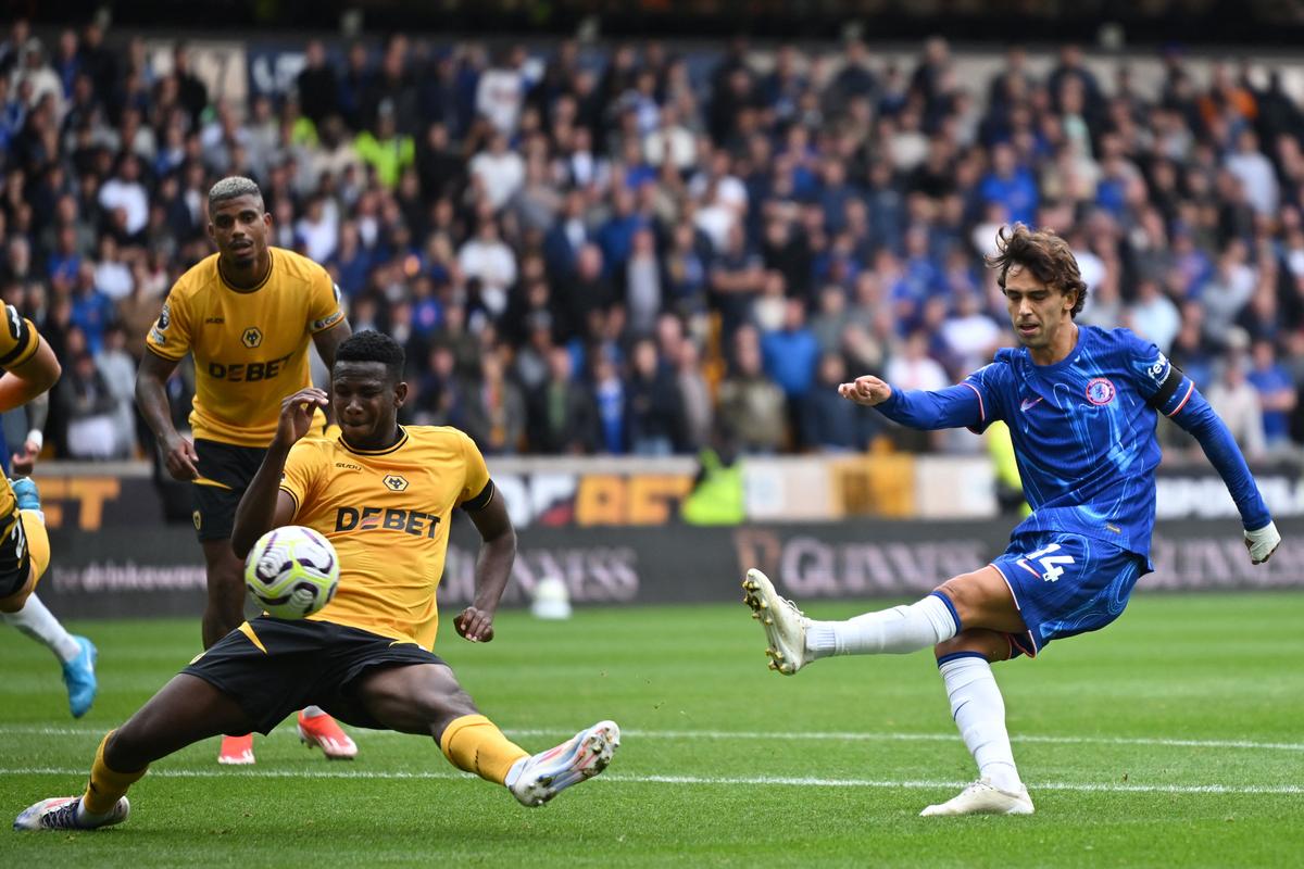 Right: Chelsea’s Joao Felix (14) set things rolling with a goal against Wolverhampton Wanderers.