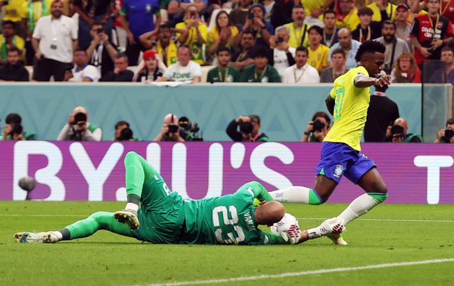 Serbia’a Vanja Milinkovic-Savic in action with Brazil’s Vinicius Junior.