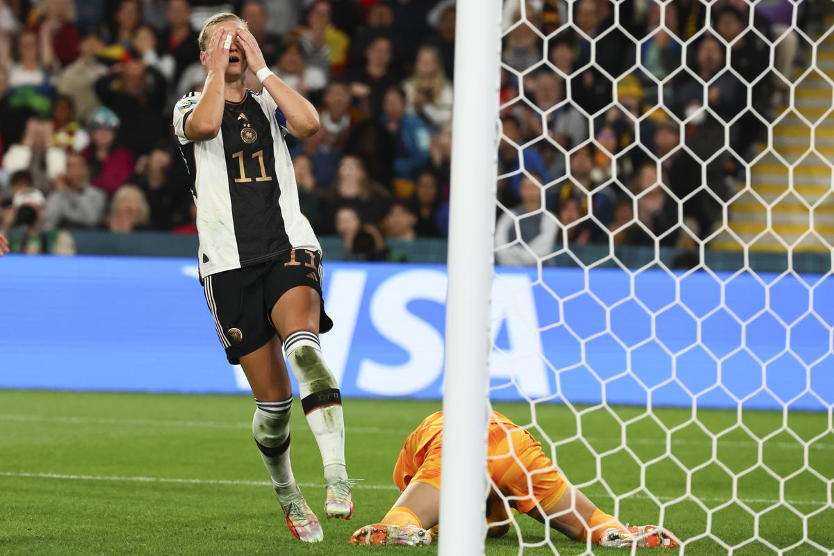Germany’s Alexandra Popp reacts after South Korea’s goalkeeper Kim Jung-mi, right, saved her short.