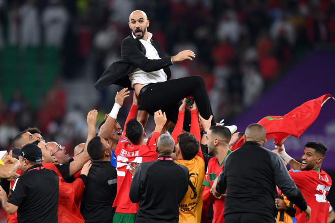 Regragui with the team after winning the FIFA World Cup Qatar 2022 quarter final against Portugal at Al Thumama Stadium.