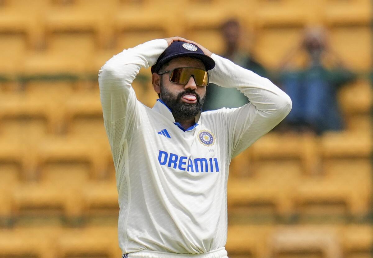 Rohit Sharma reacts on the third day of the first Test against New Zealand. 