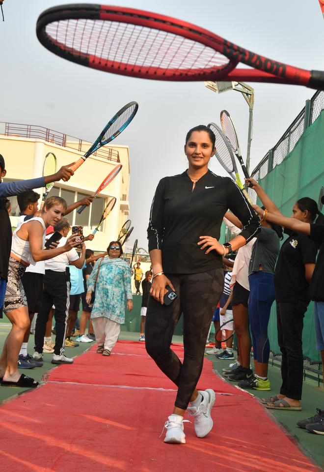 Tennis Star Sania Mirza receives ‘Guard of Honour’ from young tennis players at Sania Mirza Tennis Academy, Murthuzuguda on the outskirts of Hyderabad on Saturday.