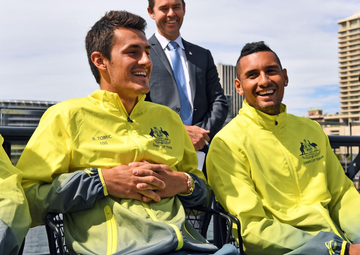 Before Kyrgios, there was Tomic | This file photo taken on September 15, 2016 shows Australia Davis Cup tennis team players Bernard Tomic (L) and Nick Kyrgios attending the official draw for their tie against Slovakia in Sydney. Tomic says he and fellow fiery Australian Kyrgios will always be “just a bit crazy” and people should get used to it. The controversial pair have frequently fallen foul of tennis authorities and have a love-hate relationship with the public. 