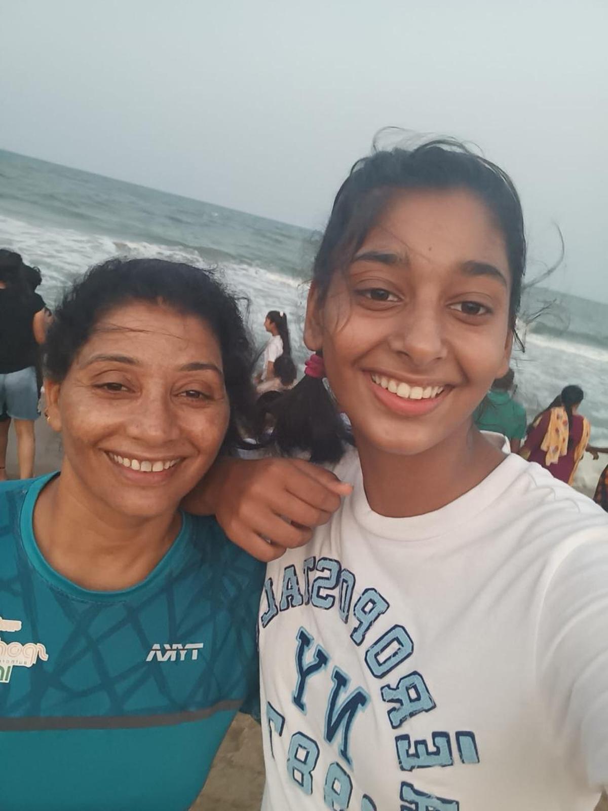 Beyond hockey: Away from the turf and competition, Pritam and Kanika share a quiet moment by the sea, simply mother and daughter.