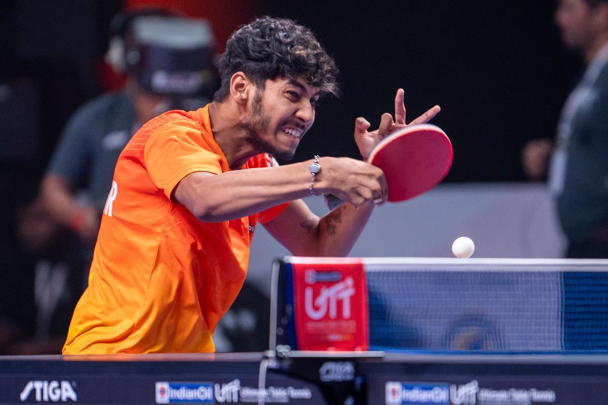 Ankur Bhattacharjee of Puneri Paltan Table Tennis in action against Lilian Bardet of Ahmedabad SG Pipers.