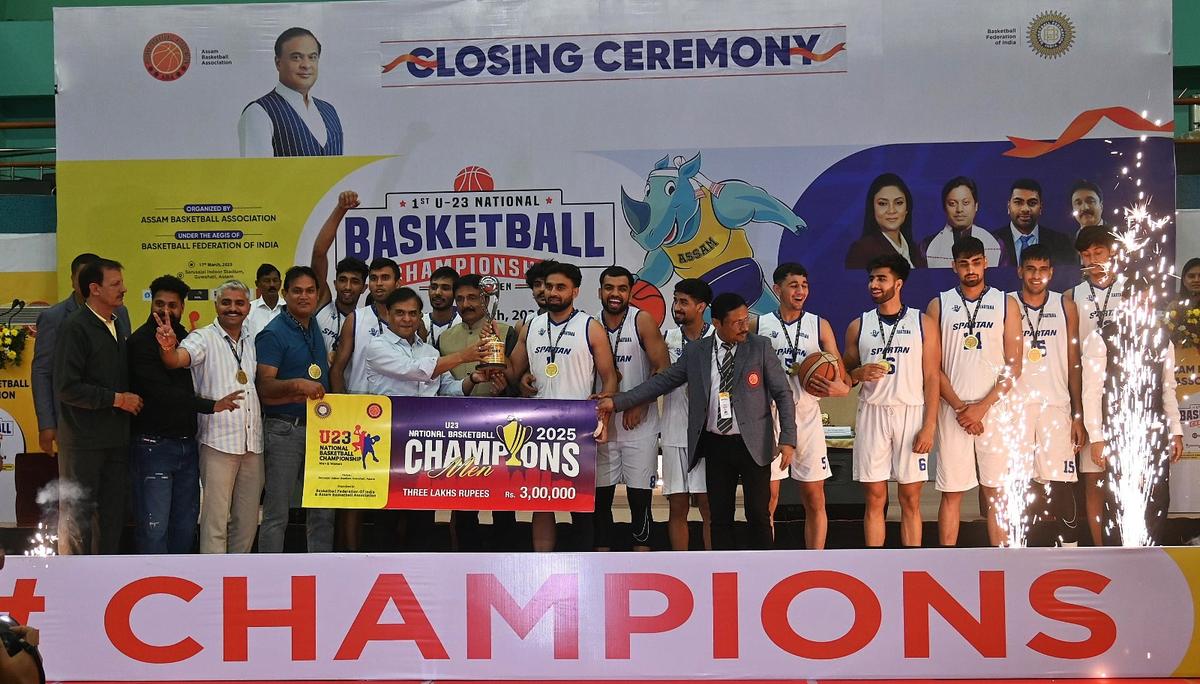 The Haryana men’s team receiving the winners’ trophy from Assam Chief Minister Himanta Biswa Sarma at the National under-23 basketball championships in Guwahati on Monday.