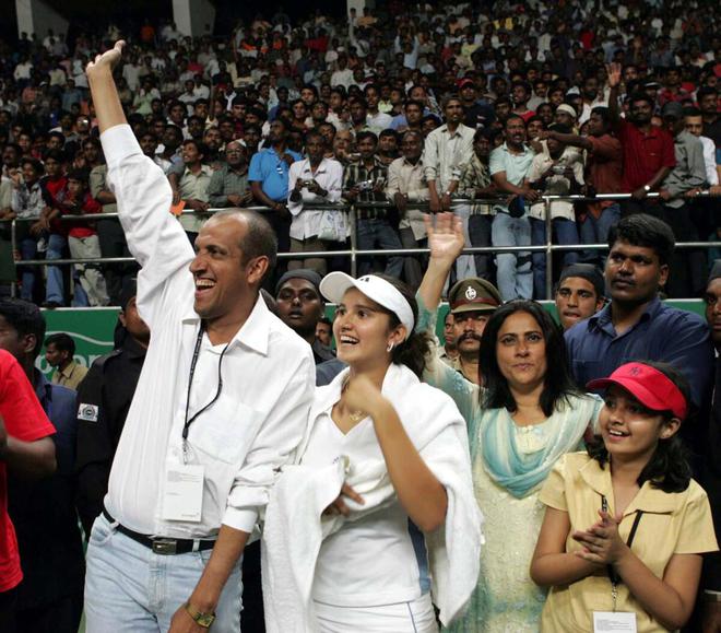 Sania Mirza sharing her victory with her father Imran Mirza, mother Nasima and younger sister Anam at the SAAP stadium in Hyderabad on Feb 12, 2005. She defeated Ukraine’s Allyona Bondarenko by 6-4,5-7,6-3 in the final of ATP Hyderabad Open. 