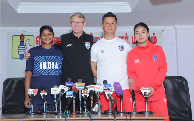 (L-R) Indian forward Indumathi Kathiresan and head coach Thomas Dennerby alongside Ananth Thapa (head coach) and Anjila Tumbapo Subba (captain) before the first of two friendly matches, in Chennai.