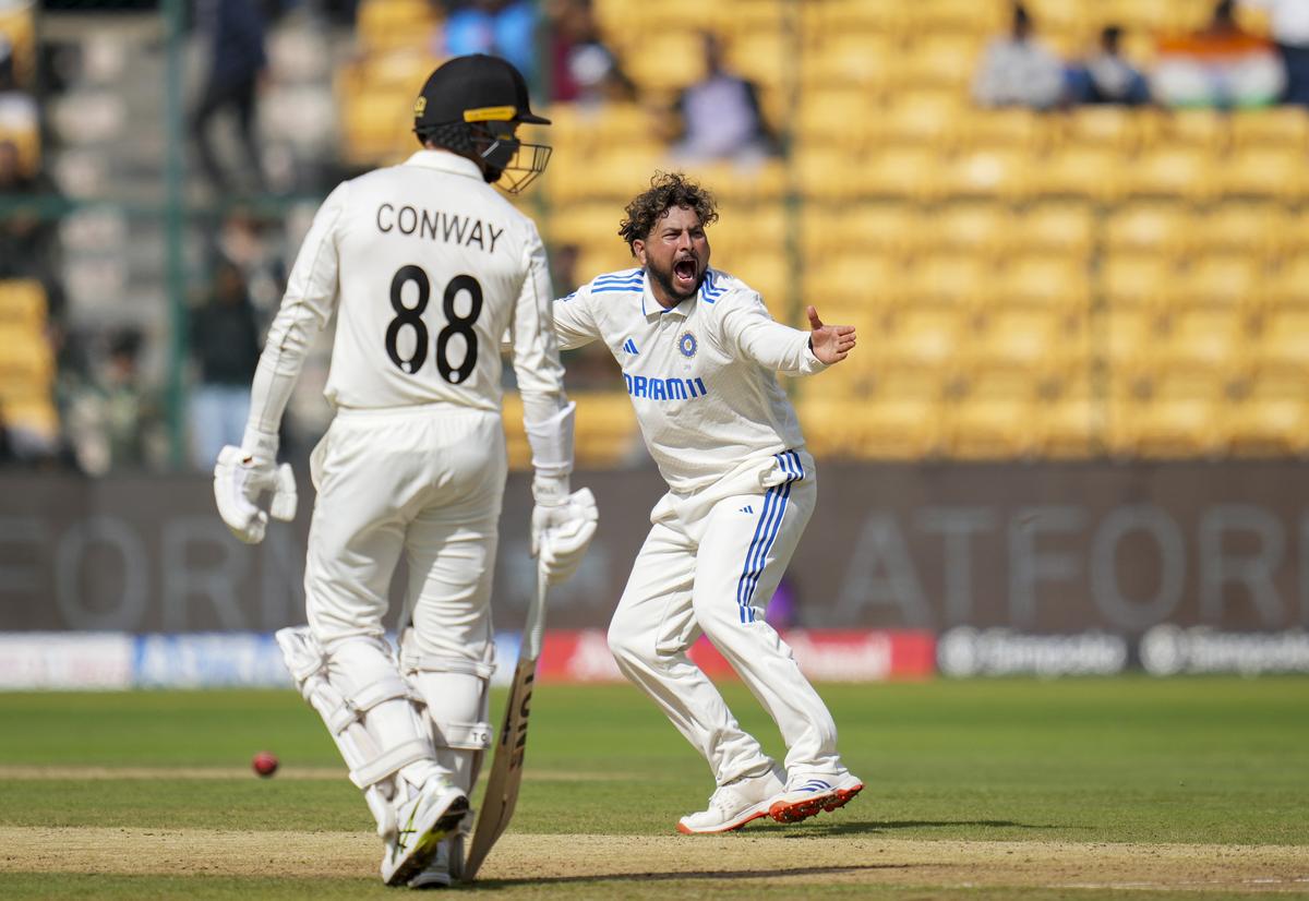 FILE PHOTO: India’s Kuldeep Yadav appeals for an LBW on the second day of the first test cricket match between India and New Zealand, at the M Chinnaswamy Stadium, in Bengaluru.