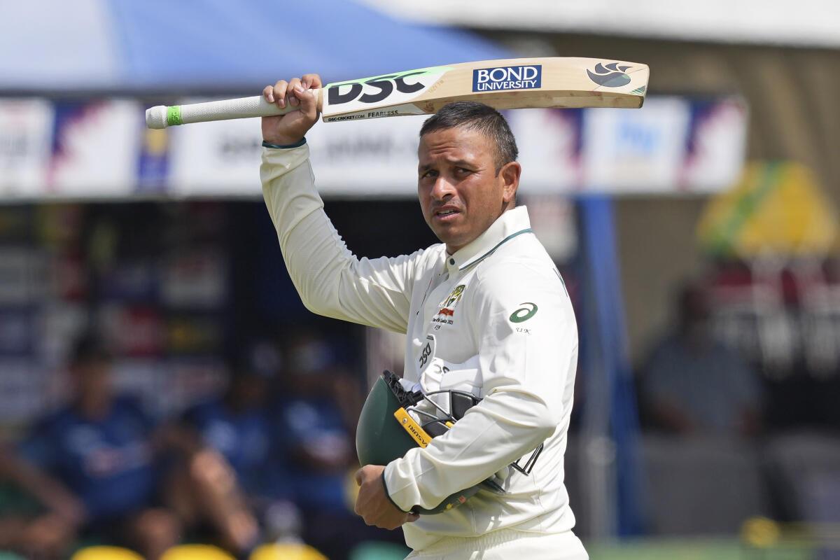 Australia’s Usman Khawaja leaves the ground after losing his wicket.
