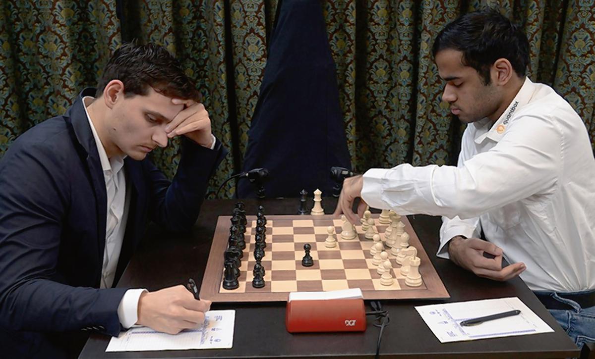 FILE PHOTO: Arjun Erigaisi versus Serbia’s Alexandr Predke in the third round on the third day of the Chennai Grand Masters Chess Championship at The Leela Palace hotel on Sunday.