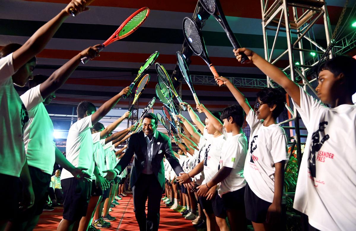 Paes — inducted into the International Tennis Hall of Fame in 2024 — following on stage after a guard of honour by young tennis players from Bengal.