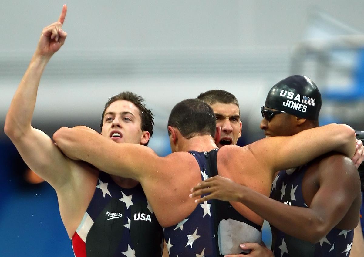 (From left to right) Garrett Weber-Gale, Jason Lezak, Michael Phelps and Cullen Jones of the United States celebrate finishing the men’s 4 x 100m Freestyle Relay Final in first place to win the gold medal at the Beijing 2008 Olympic Games.