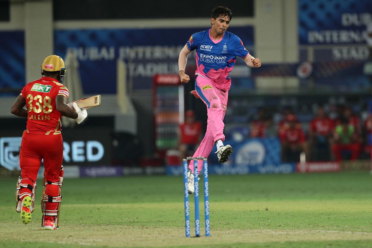 FILE PHOTO: Kartik Tyagi of Rajasthan Royals celebrates the wicket of Fabian Allen of Punjab Kings in the final over to win the game during an Indian Premier League match.