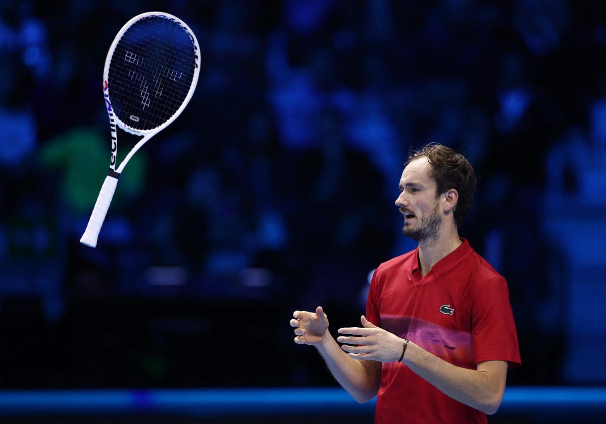 Russia’s Daniil Medvedev throws his racquet during his group stage match against Taylor Fritz of the U.S.