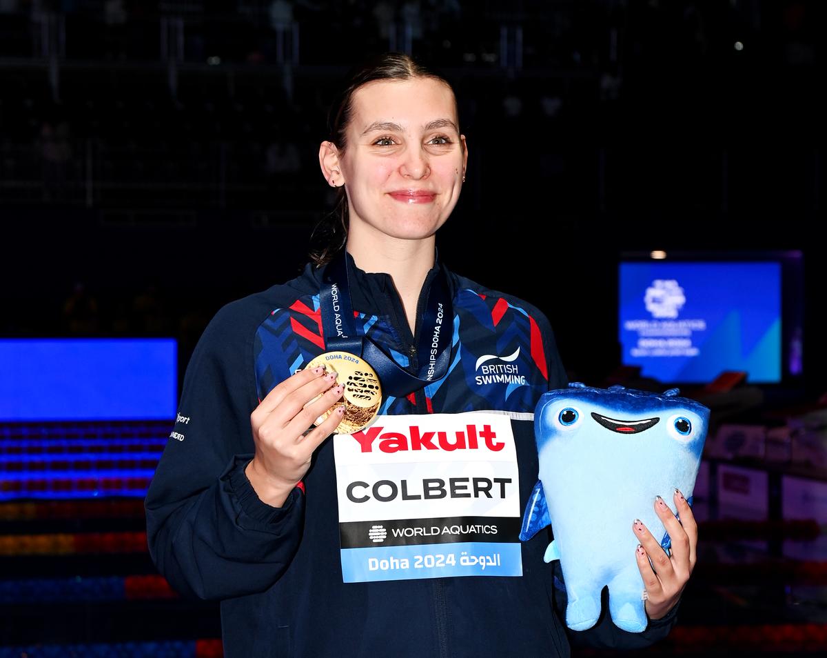 Gold Medallist, Freya Constance Colbert of Great Britain poses with her medal after the women’s 400m individual medley final at the Doha 2024 World Aquatics Championships.