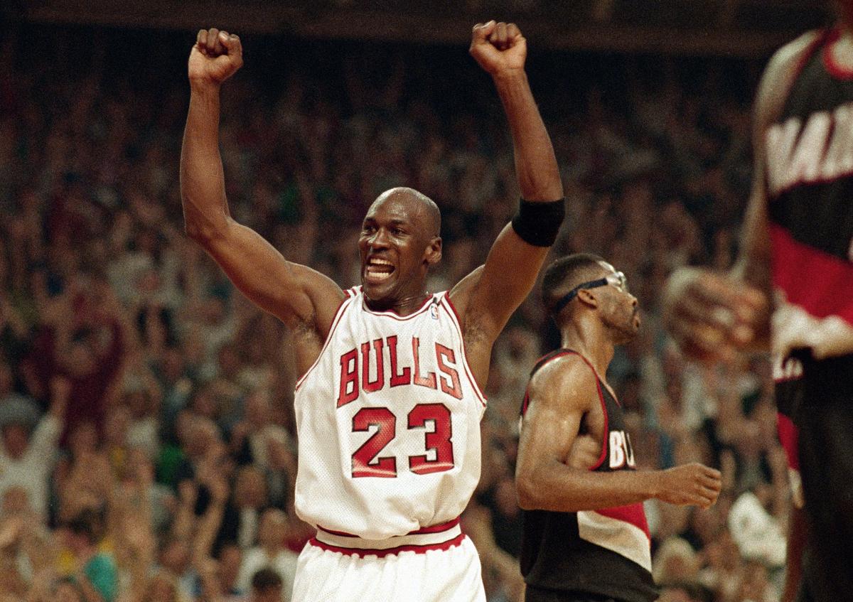 FILE PHOTO: - Michael Jordan celebrates the Bulls win over the Portland Trail Blazers in the NBA Finals in Chicago in 1992.